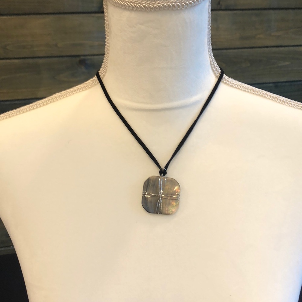 Mother of pearl square on black cord necklace